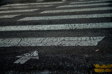 Textured grainy asphalt crosswalk of Korea