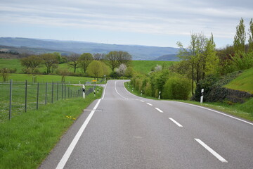 country road in rural Luxembourg during spring - obrazy, fototapety, plakaty