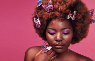 Beauty, face and black woman with butterflies in studio with creative, art and fairy fantasy....