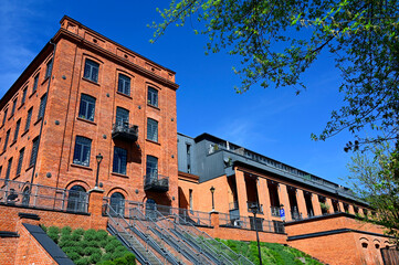 Lodz, Łódź, Poland, Europe - former huge spinning mill factory built in 1872, after revitalization it houses modern loft apartments, Ksiezy Mlyn, Tymienieckiego street