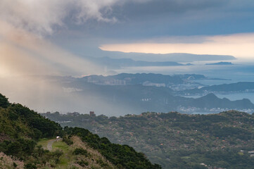 Overlook the northeast of Taiwan from the mountain peak, in a cloudy sunset time, in Jinguashi, New...