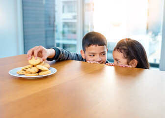 Home, brother and sister in kitchen, biscuits and siblings together, boy and girl in morning or hungry. House, kid and cute child for food or cookies on table, plate and bonding or dessert in weekend - obrazy, fototapety, plakaty