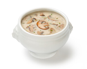  Cream of mushroom soup in a white porcelain tureen isolated on a white background.  - obrazy, fototapety, plakaty