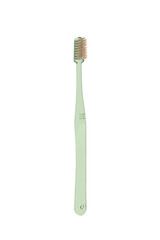 Green toothbrush on white background