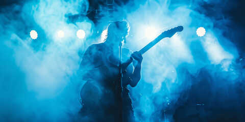 Electric Rock Guitarist in Blue Stage Lights