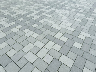 Outdoor floor material. gray paved road from concrete pavers