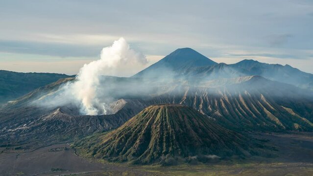 Time lapse of sunrise at smoking active Mount Bromo and Semeru volcano on East-Java, Indonesia