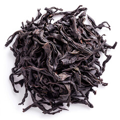 Obraz premium Dry black tea leaves isolated white background