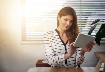 Lens flare, window and business woman with tablet in office for email, internet and communication...