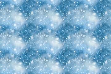 Fototapeta premium Falling snowflakes pattern on a dreamy blue background