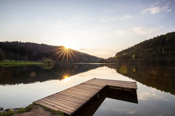 Lake in sunset. Beautiful landscape. Located in the middle of the forest and surrounded by nature,...