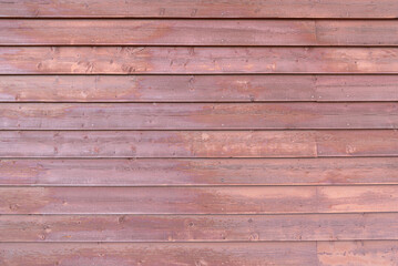 old red wooden wall with horizontal boards