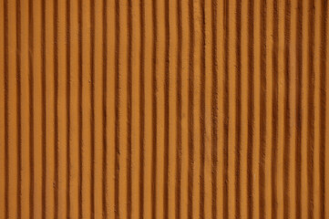 decorative plaster in the form of brown lines close-up