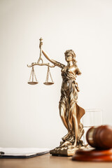 A brown wooden desk in a courtroom symbolizes authority and legal proceedings. It serves as a platform for lawyers to pursue justice, balancing equality and delivering judgments in the legal system.