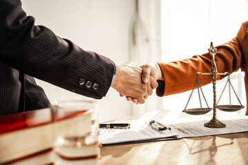 Shaking hands signifies mutual agreement and professionalism. It embodies the essence of justice,...