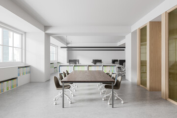 Modern office interior with meeting table and coworking zone, panoramic window