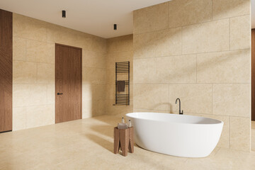 Stylish hotel bathroom interior with tub and rail ladder, wooden door