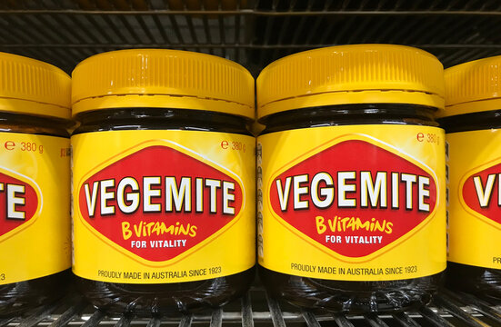 South Australia, Australia &ndash; April 12, 2024: Row of Vegemite jars displayed on shelf of supermarket