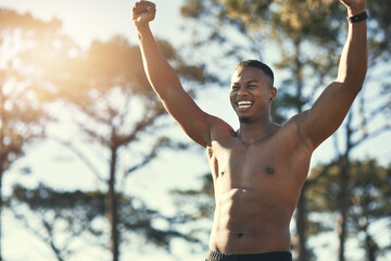 Victory, sports and forest for African man, athlete and nature for workout, training and exercise. Active, energy and person in environment, muscle and wellness for fitness and healthy body outdoor