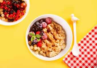 Oatmeal cereal porridge with fresh berries. Healthy breakfast.
