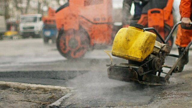 Worker street road construction asphalt industrial city builder