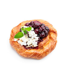 Homemade cherry puff pastry bun isolated on white