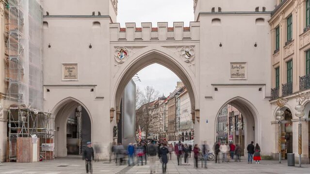 Karlstor in the old town of Munich timelapse with unidentified people walking on the street. The Karlstor is the western city gate of the historic old town. Entrance to Kaufingerstrasse. Germany