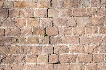 Very old stone wall with a crack, perfect for background.. Barcelona, Catalonia, Spain.