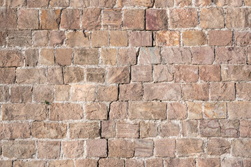 Fototapeta premium Very old stone wall with a crack, perfect for background.. Barcelona, Catalonia, Spain.
