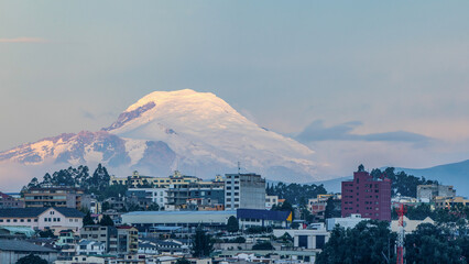 In downtown Quito, the capital of Ecuador, the ice-covered volcano can be seen in high visibility.