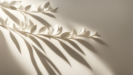 A refreshing image of leaves, sunlight, and leaf shadows hanging on an ivory wall.