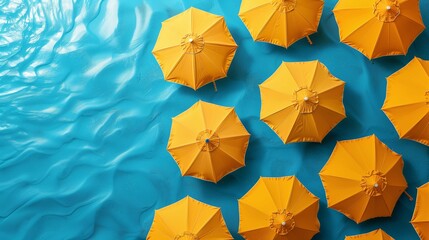 Aerial View of Yellow Umbrellas on Textured Blue Background