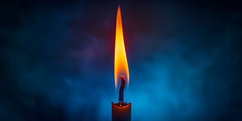 Flickering Flame in Mystical Blue Gradient Backdrop Casting Warm Glow of Light and Shadow