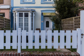 white fence with a fence