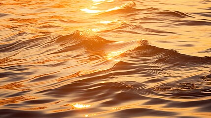 Wave patterns Rippling water under the golden hues of sunset, creating a mesmerizing spectacle on the tranquil surface.
