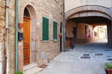 Chiusdino, Siena, Tuscany, Italy - Typical tuscan historical town with narrow street and terracotta...