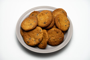 Delicious chocolate chip cookies on white background, a baked goods treat