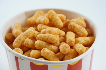 Israeli famous snack Bamba - made of peanut butter. Peanut Flips or peanut puffs