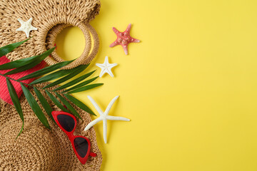 Summer vacation background with straw hat, bag and beach accessories. Top view, flat lay - 783845352