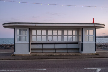 shelter on exmouth seafront at sunset devon england uk 