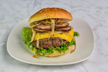 cheese burger with  mushrooms and onions