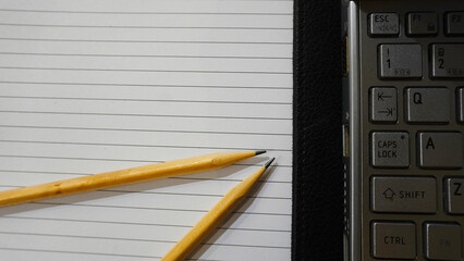 Pencil and paper of writing book for template background , banner , web , pamphlet and brochure	