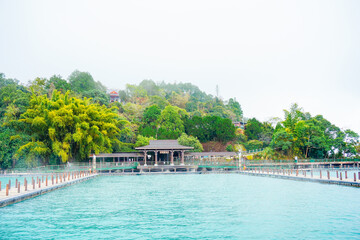 Sun Moon Lake，Nantou, Taiwan, Republic of China, 01 22 2024: The landscape of Sun Moon Lake in a cloudy and foggy day