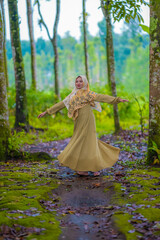 woman happy in the forest