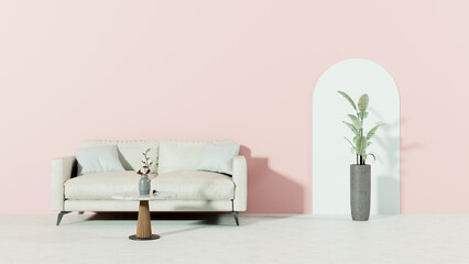 a white couch sitting next to a pink wall