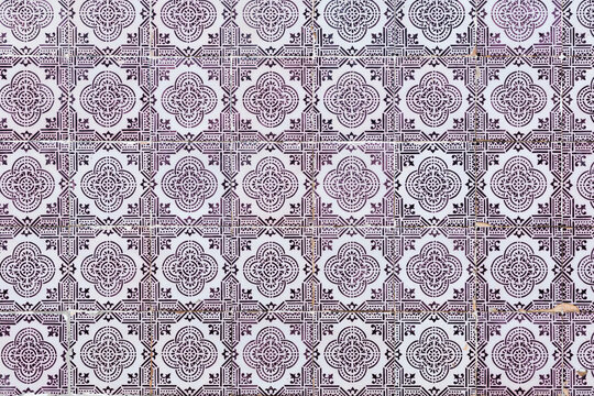 Mosaic of tiles with laced patterns inspired in arab style 
Original from Portugal