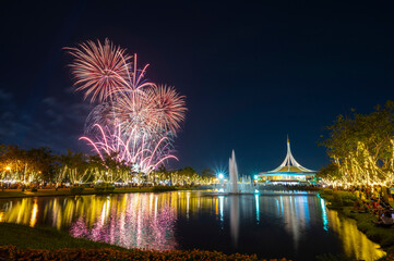 Suan Luang Rama IX Park. With decorative lighting Twilight time and fireworks