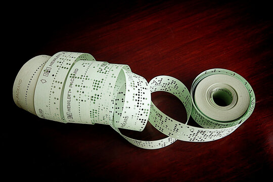 Old Teletype punched paper tape, used as data storage and programming in Hewlett-Packard computers, years '70