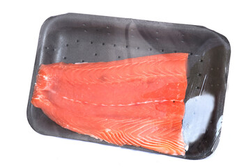 Fresh salmon fillet in a white styrofoam tray - 783903116