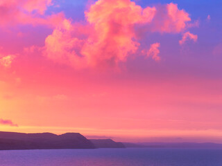 Fiery Dawn Clouds on an April Sunrise over the Jurassic Coast